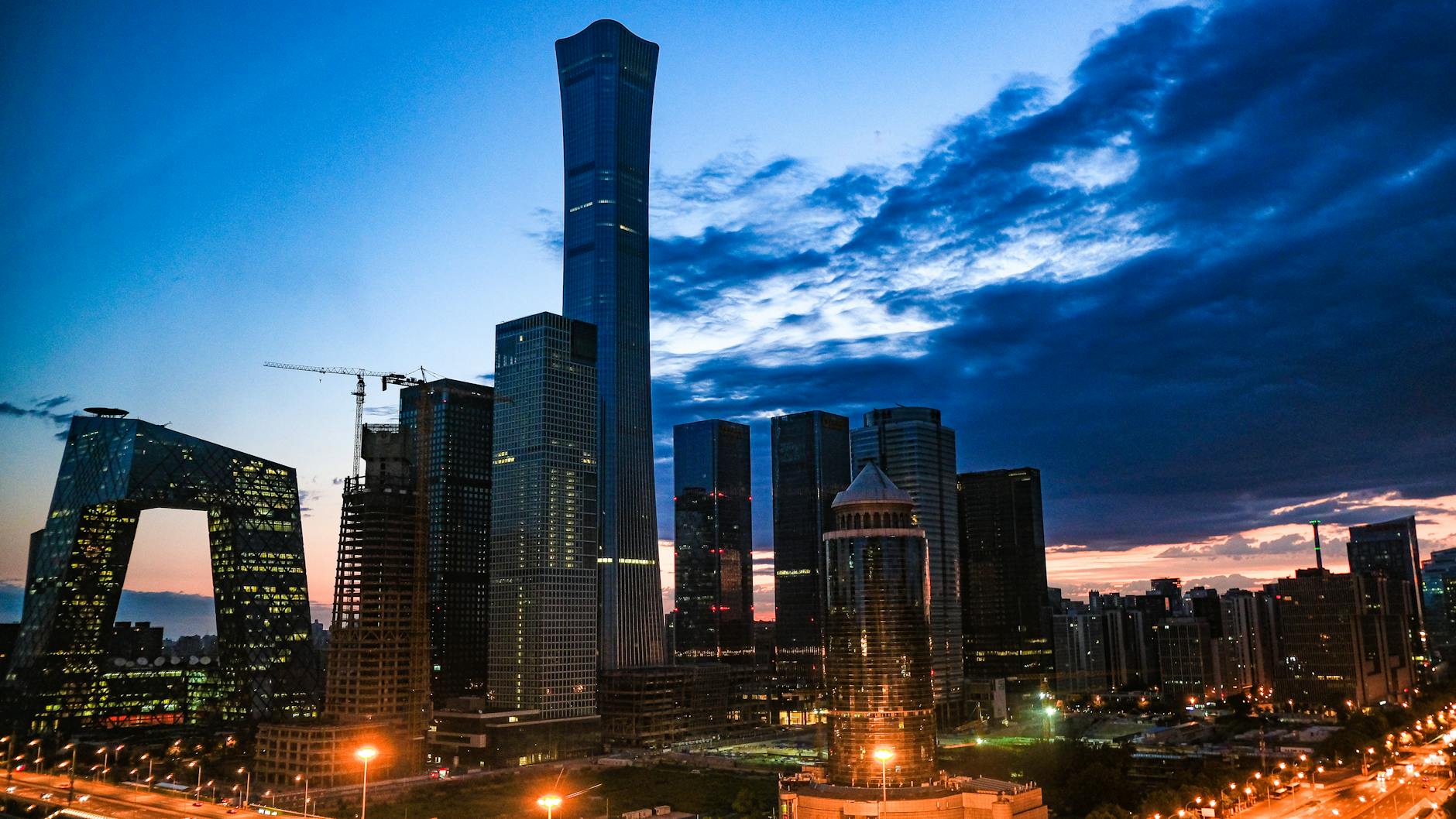 Stunning view of Beijing's skyline featuring modern skyscrapers at twilight.