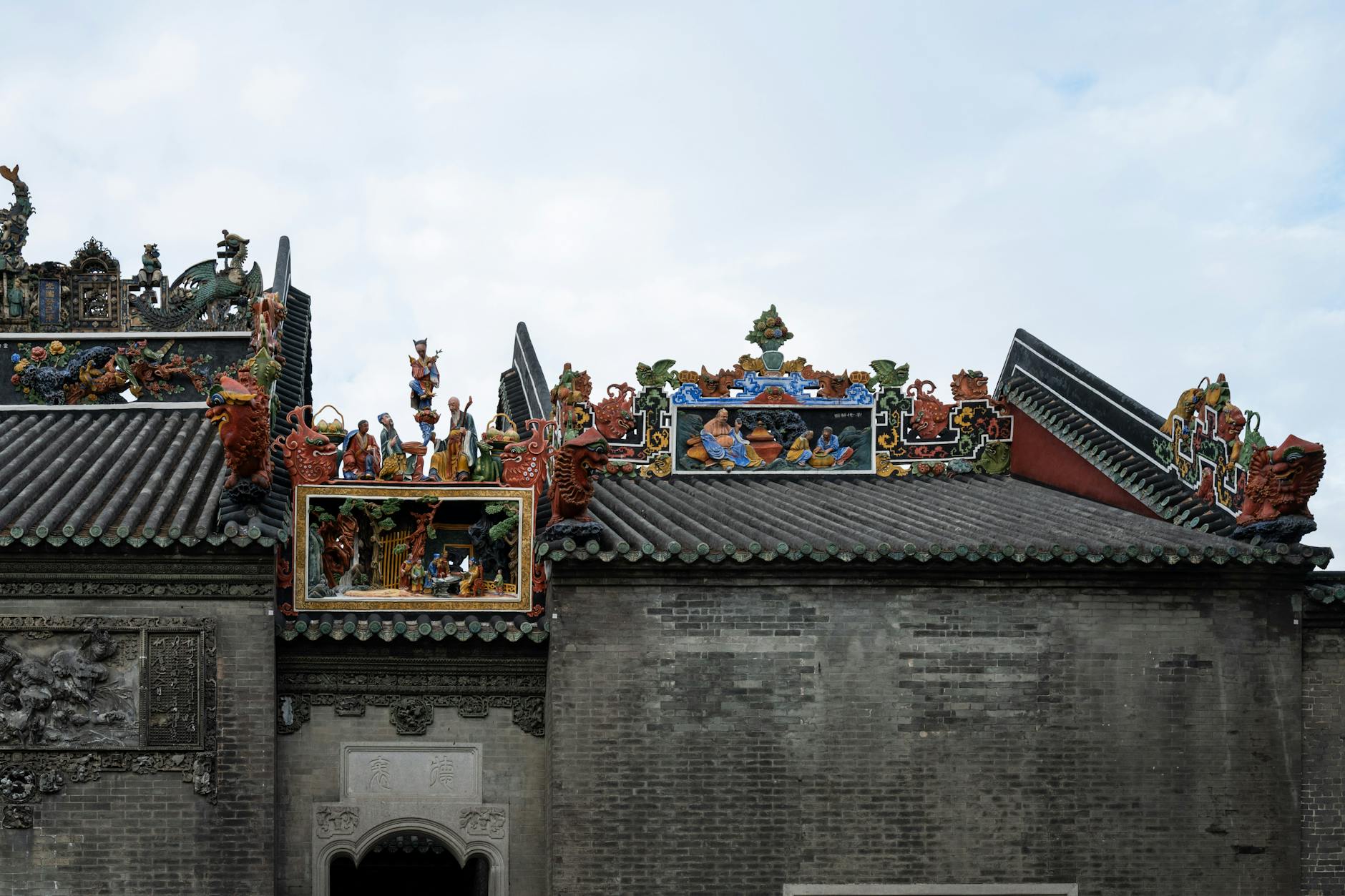 Vibrant art decorates the rooftop of Guangzhou's historic Chen Clan Ancestral Hall.