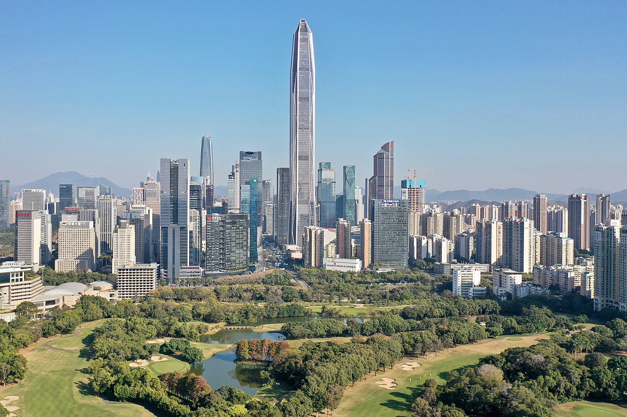 The Futian CBD's skyline looking east from the west. The Ping'an Finance Center which is the tallest building at the background, the SEZ Dev Grp Golf Course at