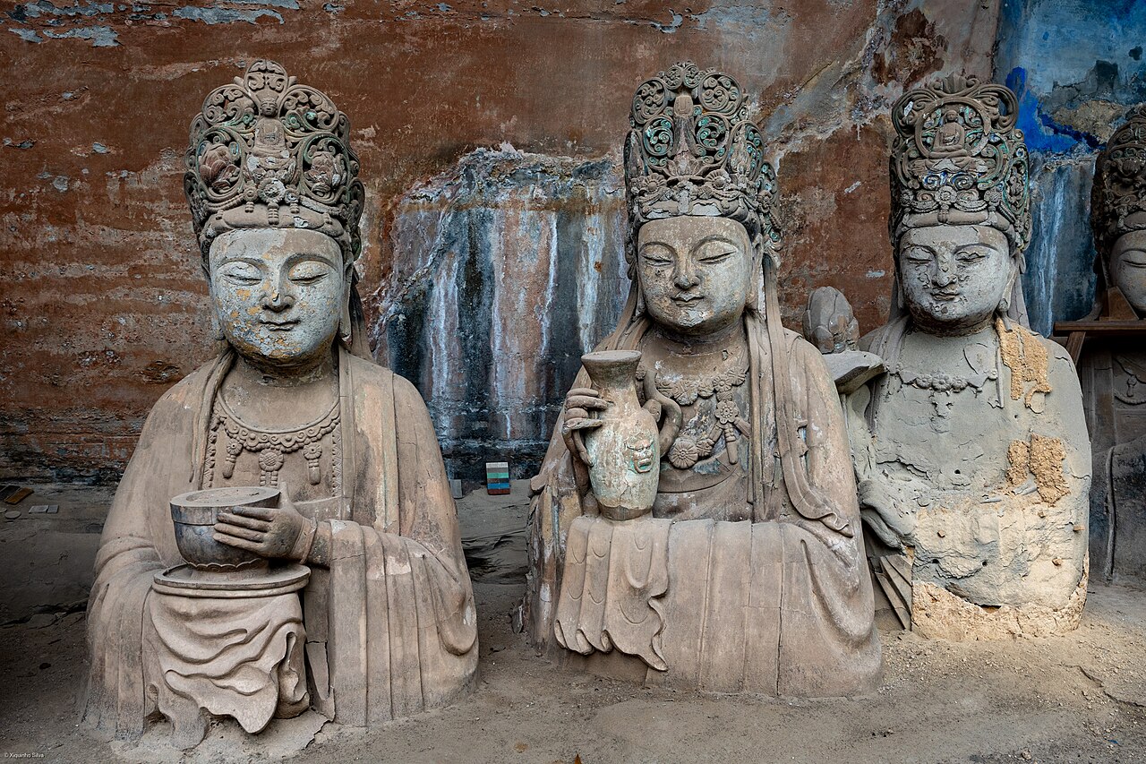The Dazu Rock Carvings in Baodingshan, located in Chongqing, China, are a magnificent display of religious art dating back to the 7th century AD. These carvings