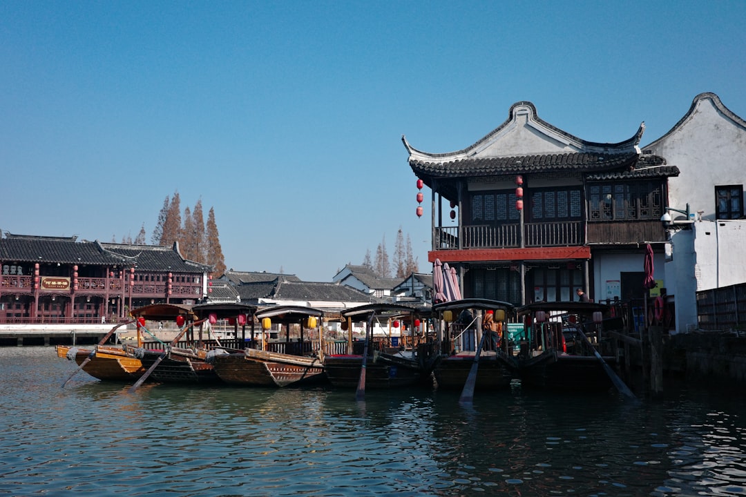 A body of water filled with lots of boats