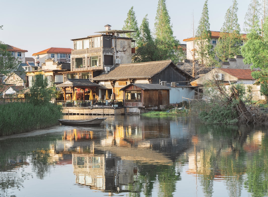 Buildings and water create a beautiful reflection.
