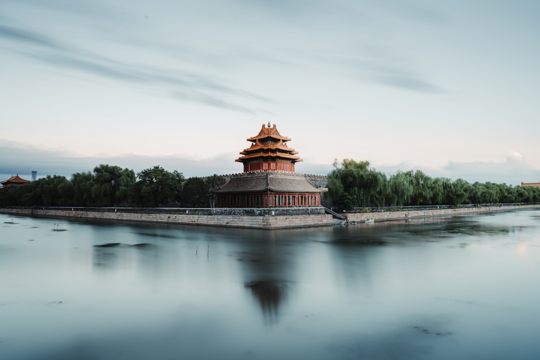 A large body of water with a tower in the middle of it