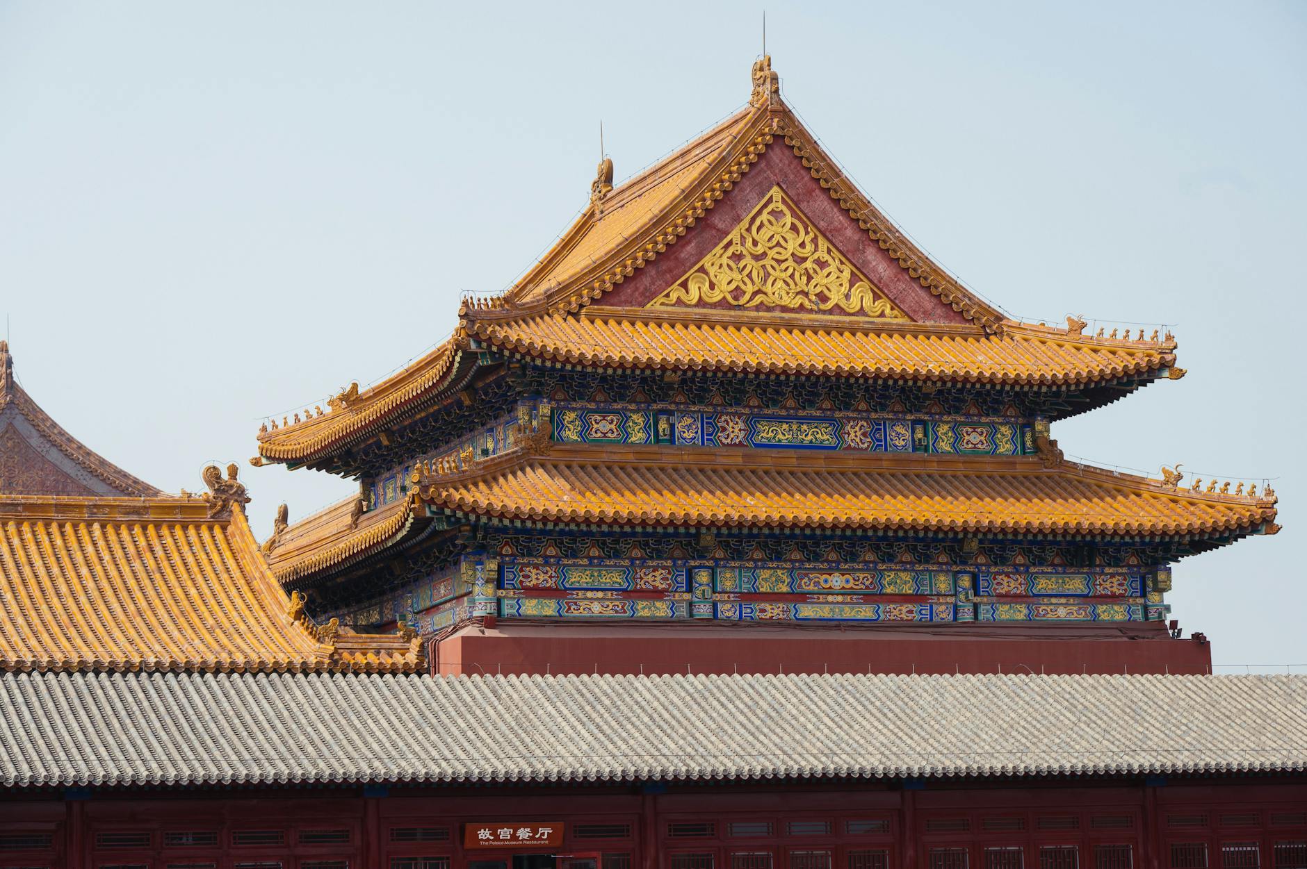 Detailed view of ornate rooftops in the historic Forbidden City, Beijing.