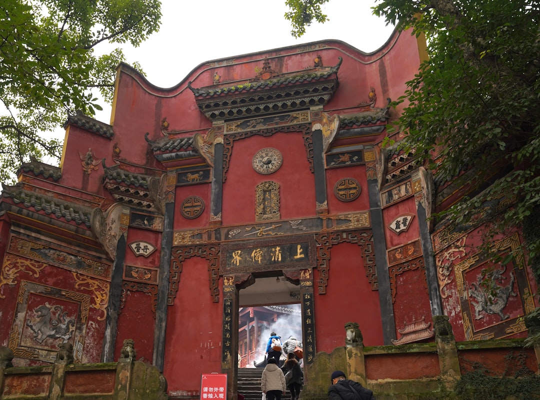Ornate red temple entrance with intricate details