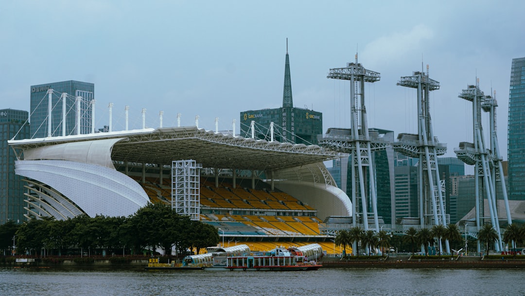 a large building sitting next to a body of water
