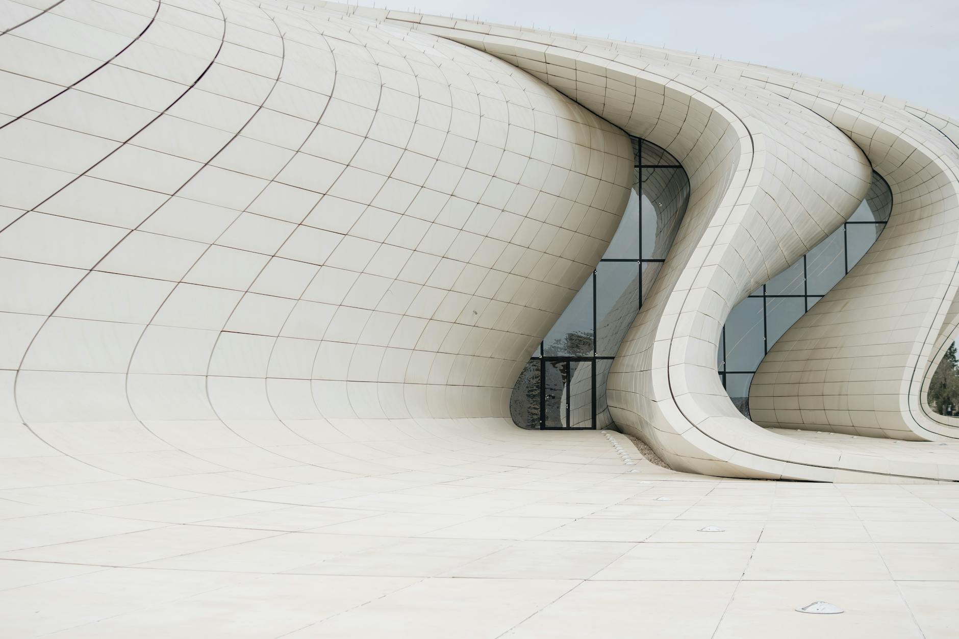 Modern architectural marvel of Heydar Aliyev Center in Baku, Azerbaijan, showcasing its unique curvilinear design.