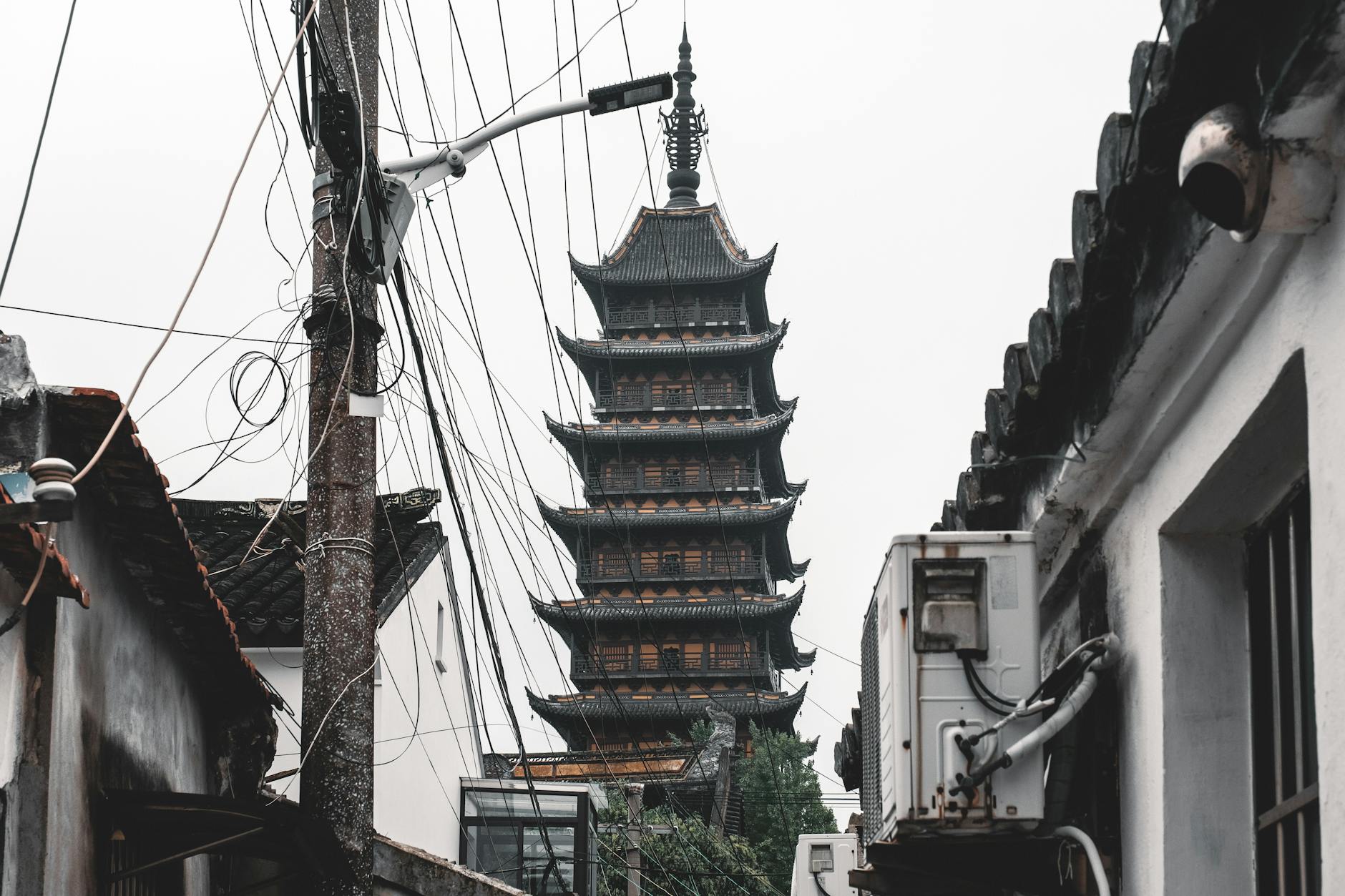 Beisi Pagoda in Suzhou, China captured amidst urban elements and local architecture.