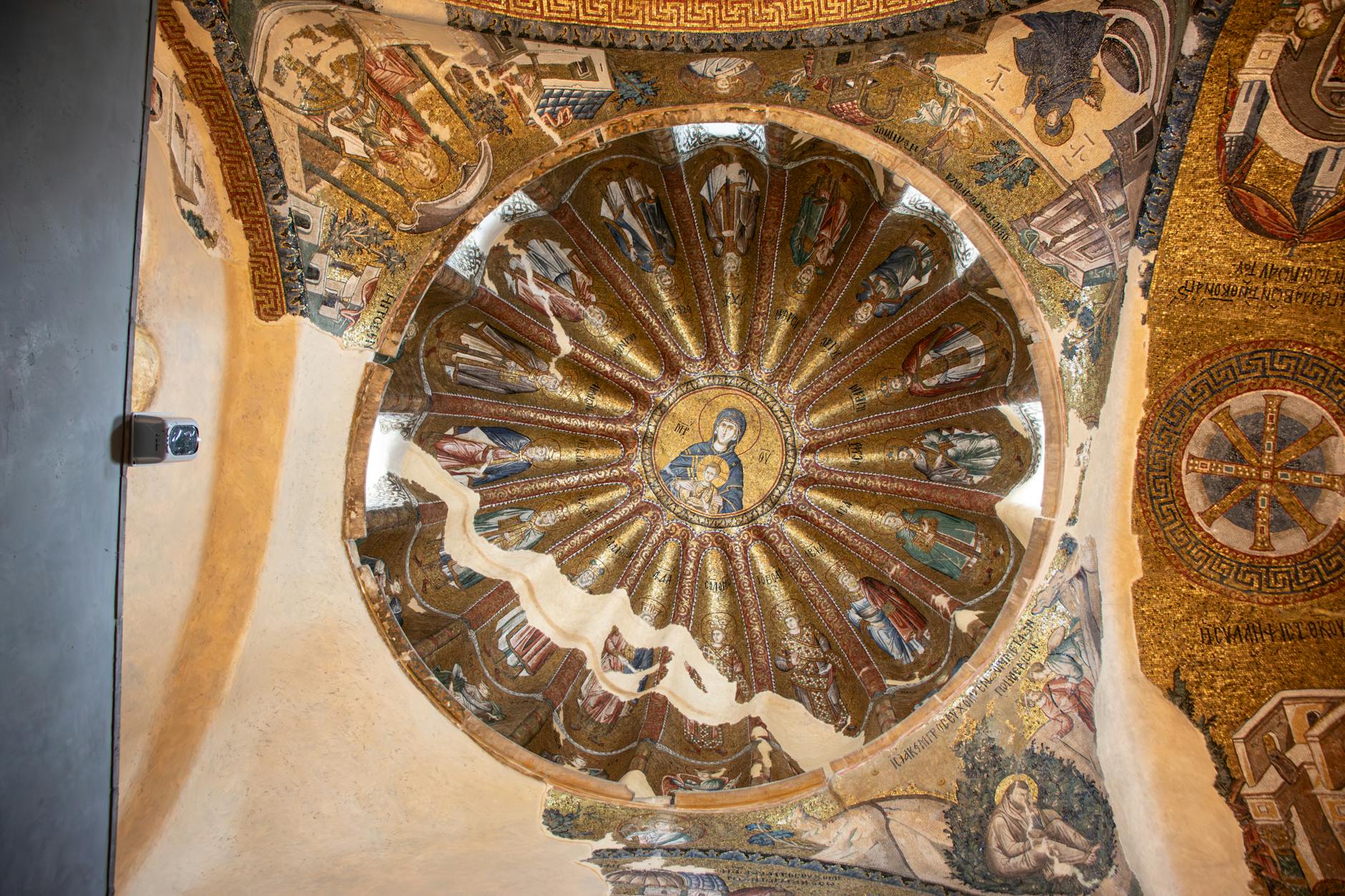 A detailed view of a Byzantine mosaic ceiling in Istanbul, showcasing historical religious art.