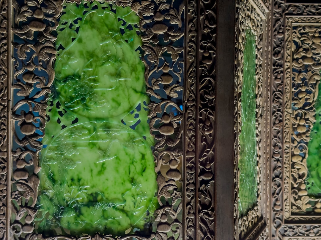 a close up of a green object on a wall