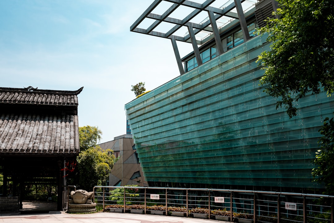 Modern building contrasts traditional architecture.