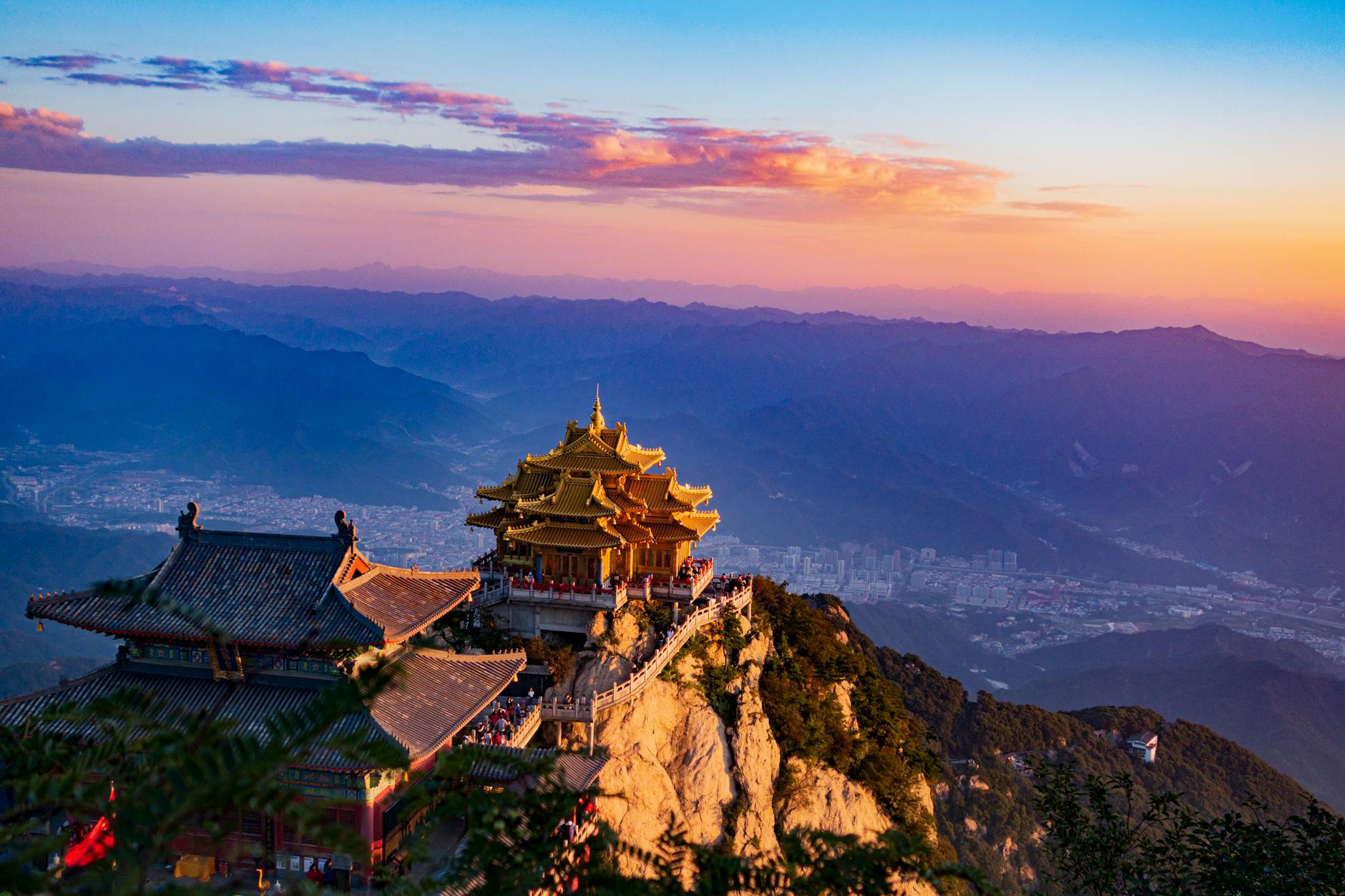 Breathtaking aerial view of Mount Laojun Temple at sunset in the mountains of China.