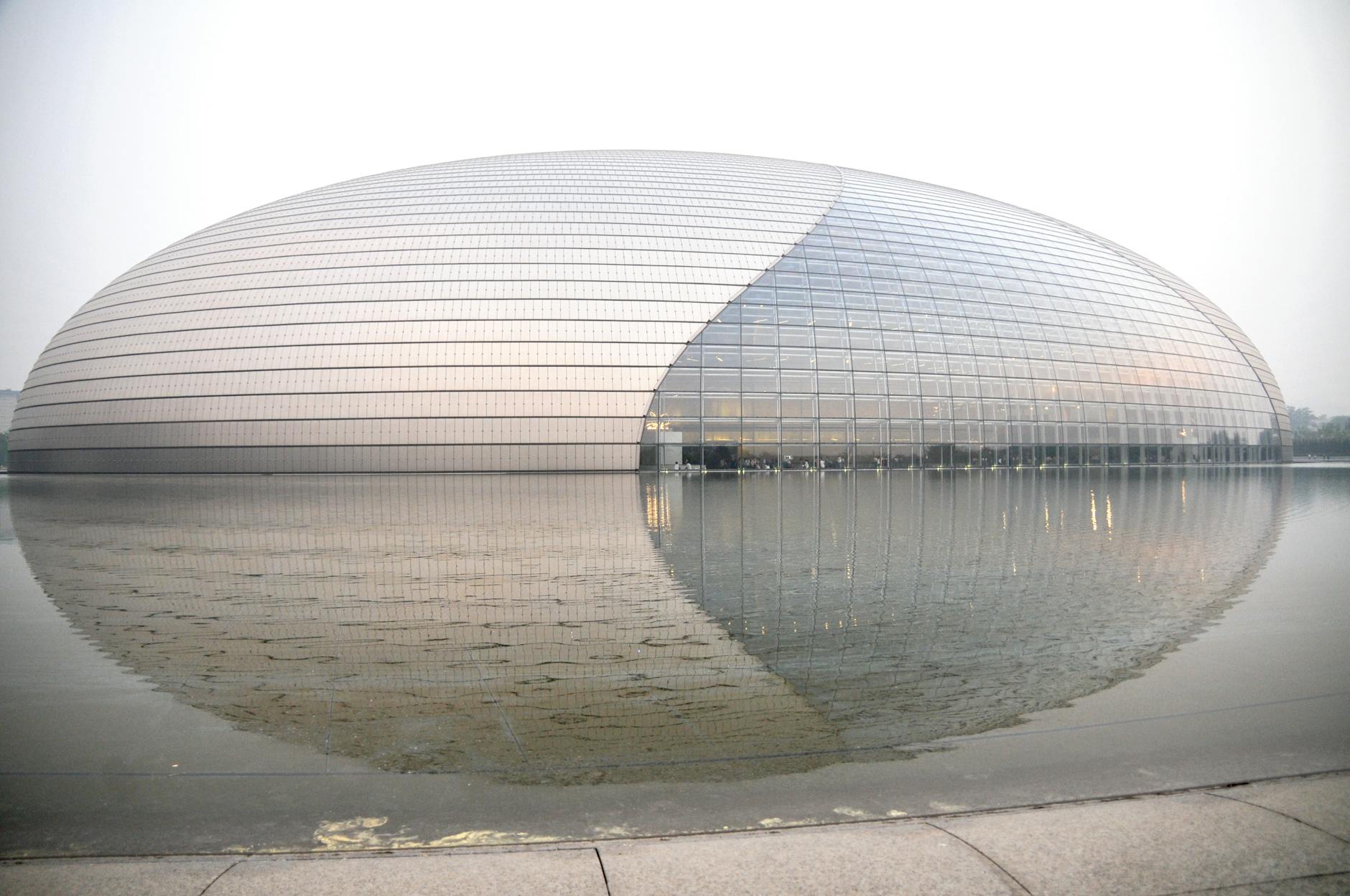 National Centre for the Performing Arts in Beijing with sleek reflective dome design.