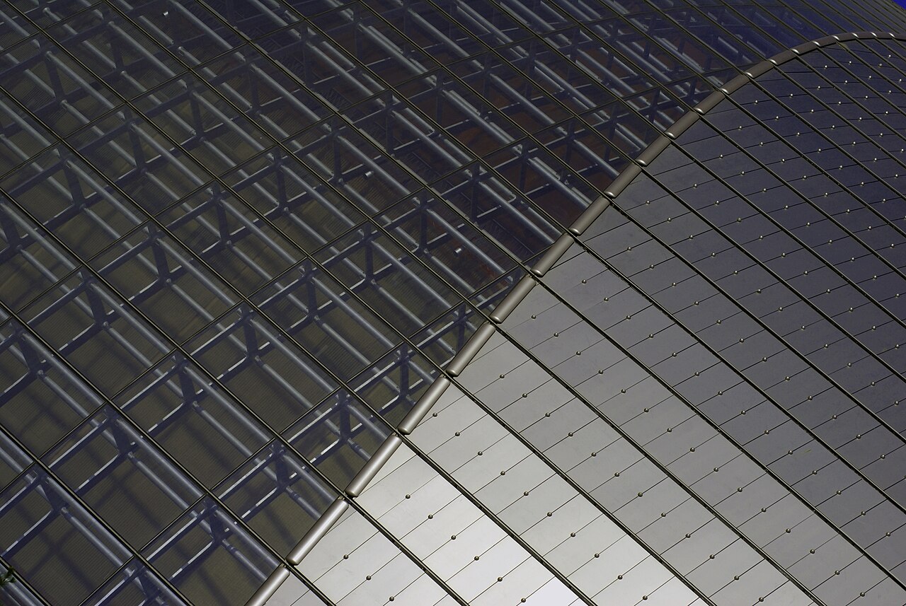 Detail of the National Grand Theatre in Beijing, China. Transition from glass to titanium portion of roof.