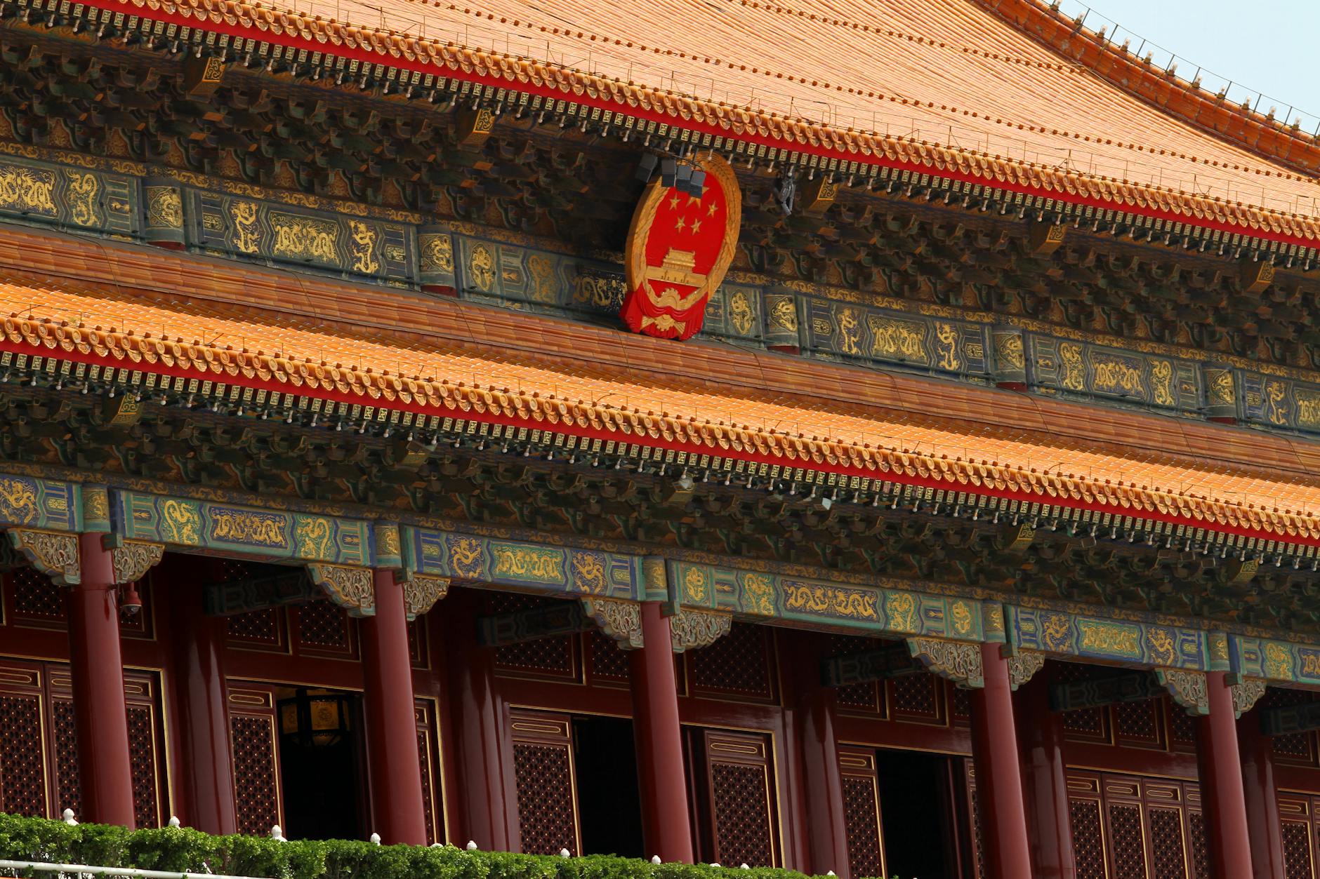 Close-up view of ornate architectural details in Beijing's Forbidden City, showcasing traditional Chinese design elements.