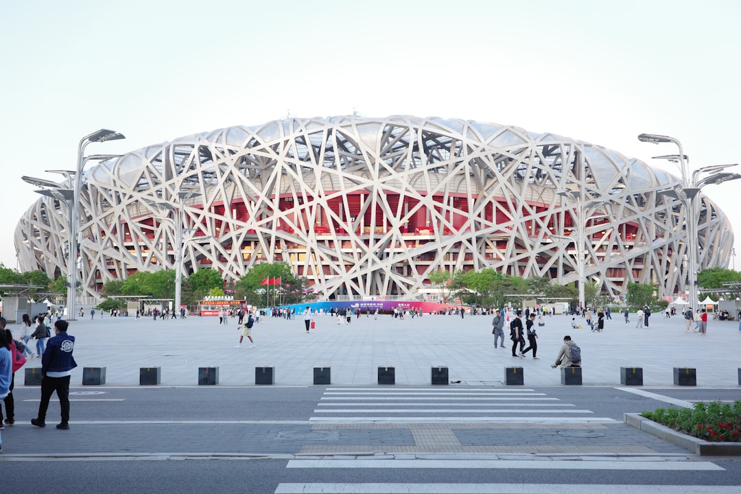Here's a possible caption: beijing's iconic bird's nest stadium is pictured.