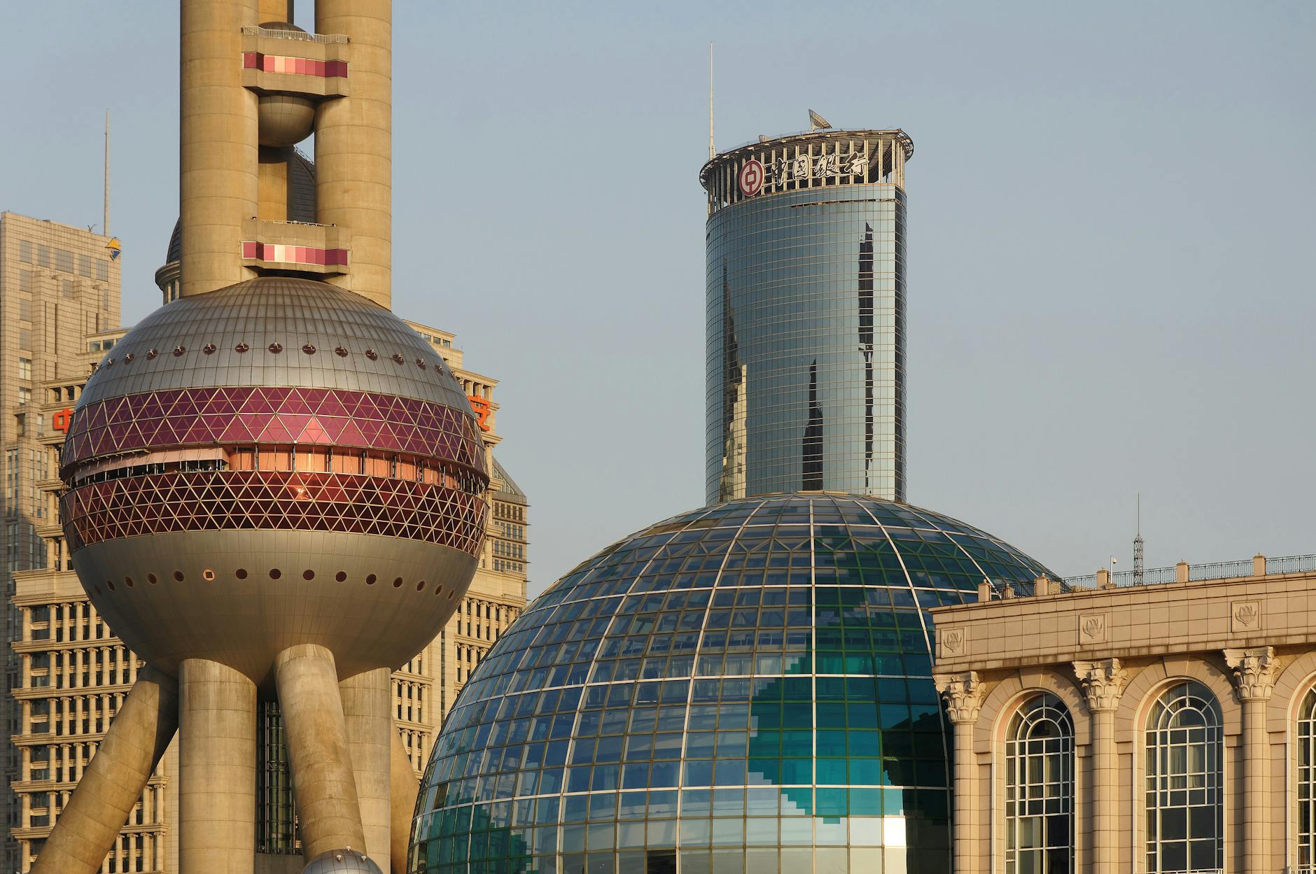 Close-up view of Shanghai's iconic modern skyscrapers at day.