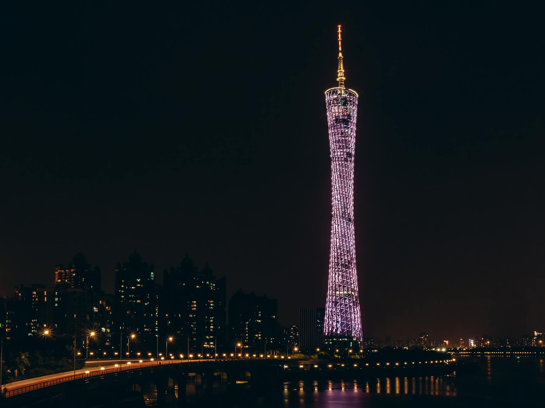 Breathtaking view of Canton Tower glowing against the night sky in Guangzhou, China.