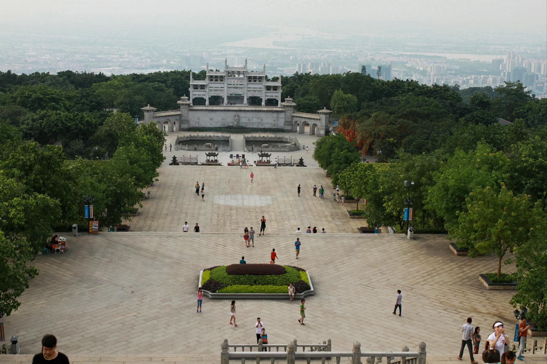 Aerial view of the Sun Yat-sen Mausoleum in Nanjing with tourists exploring the scenic park.