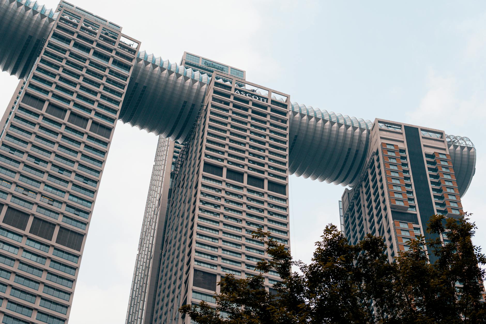 View of the futuristic architecture of Raffles City Chongqing, a prominent tourist landmark in China.
