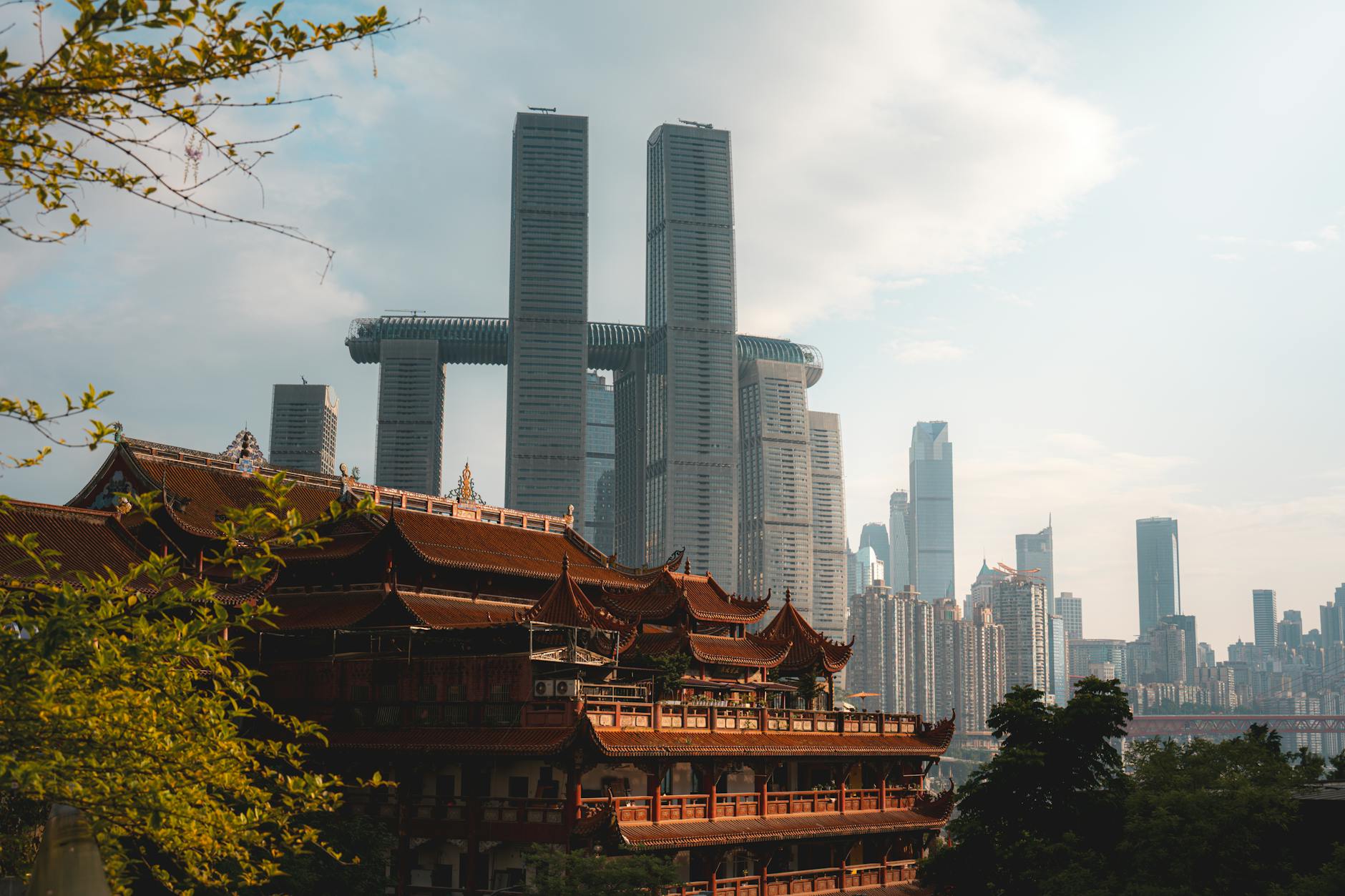 Discover the blend of modern skyscrapers and traditional architecture in Chongqing's breathtaking cityscape.