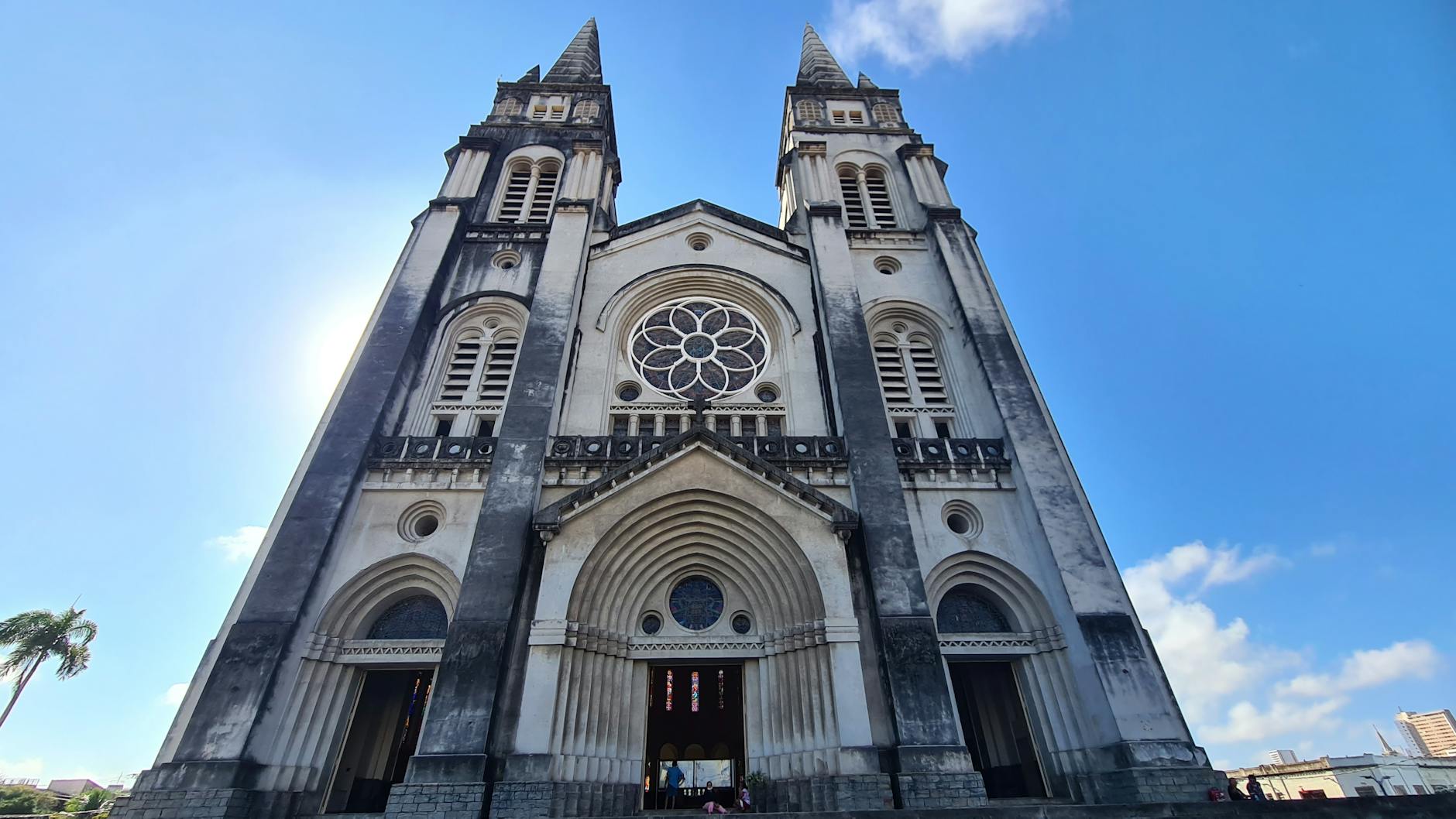 Stunning view of Catedral Metropolitana in Fortaleza, showcasing Gothic Revival architecture under the bright summer sky.