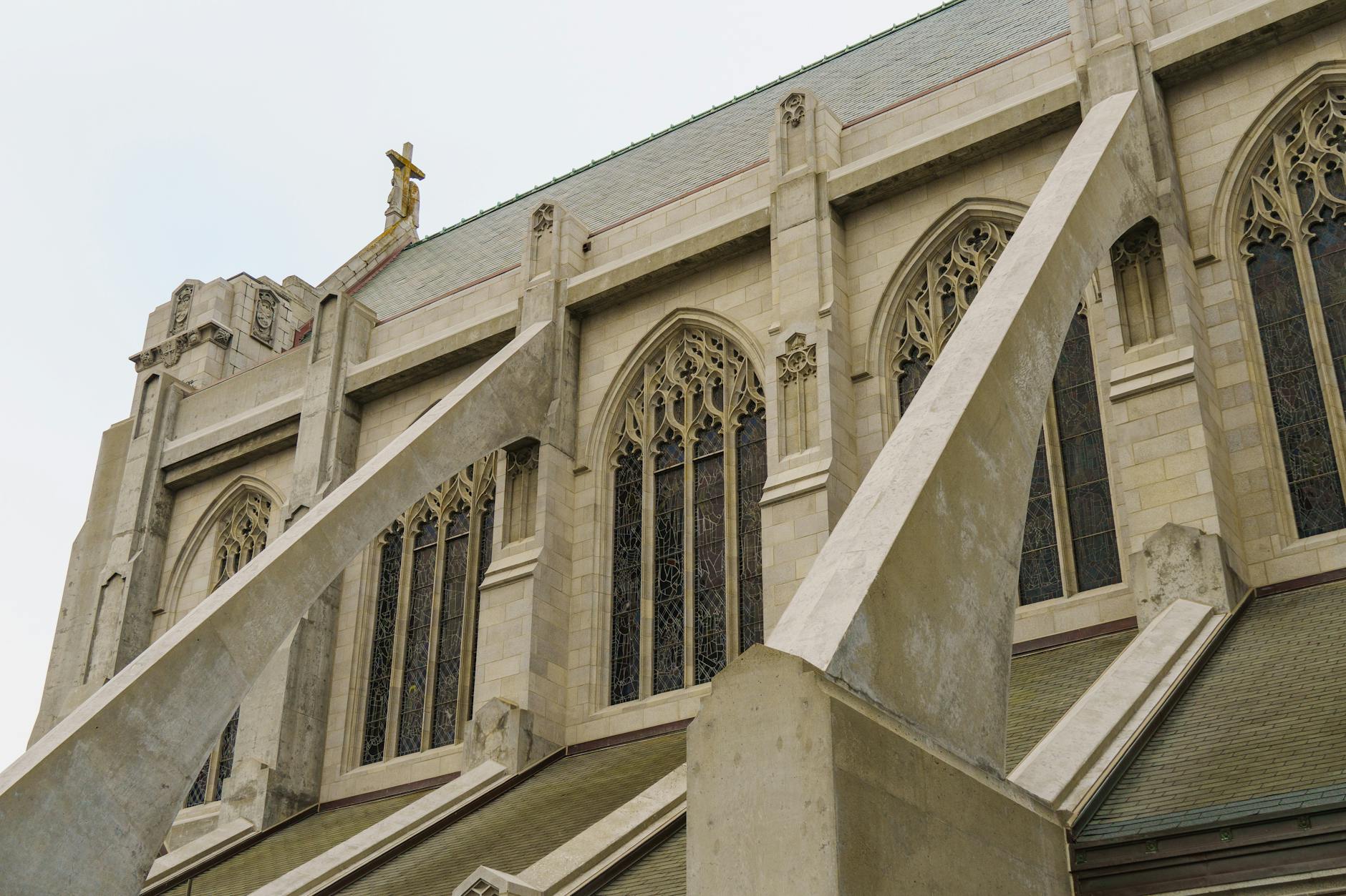 A close-up view of a gothic cathedral's architecture, showcasing intricate designs.