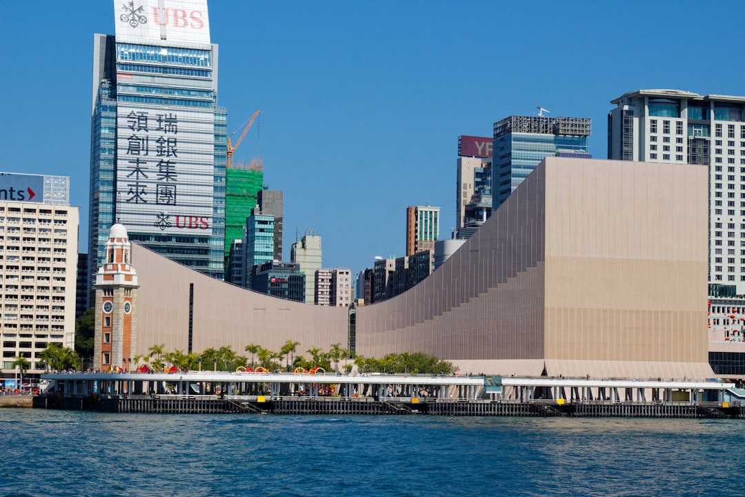 a body of water with buildings in the background