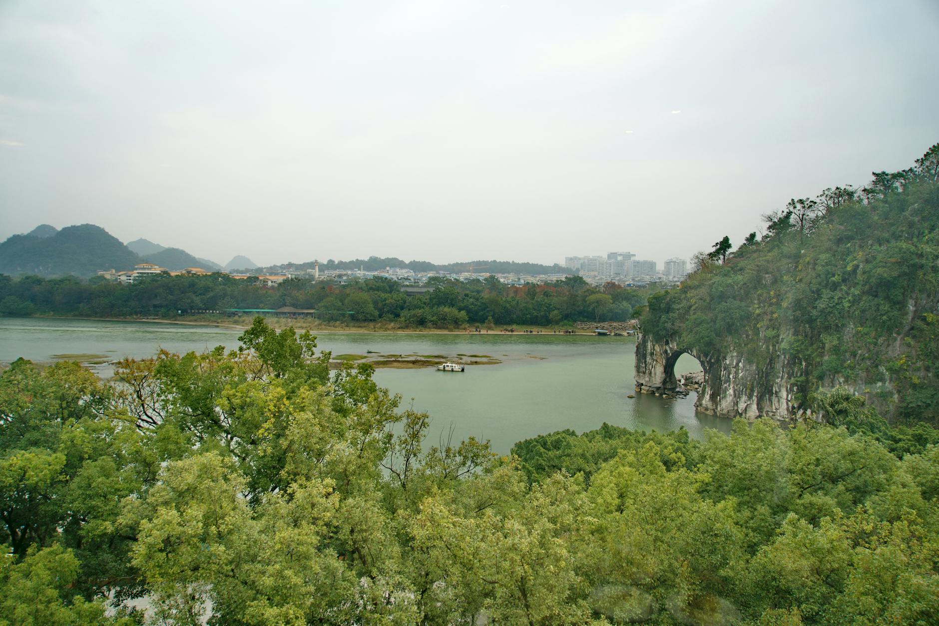 A beautiful landscape of Elephant Trunk Hill and surrounding trees in Guilin, China.