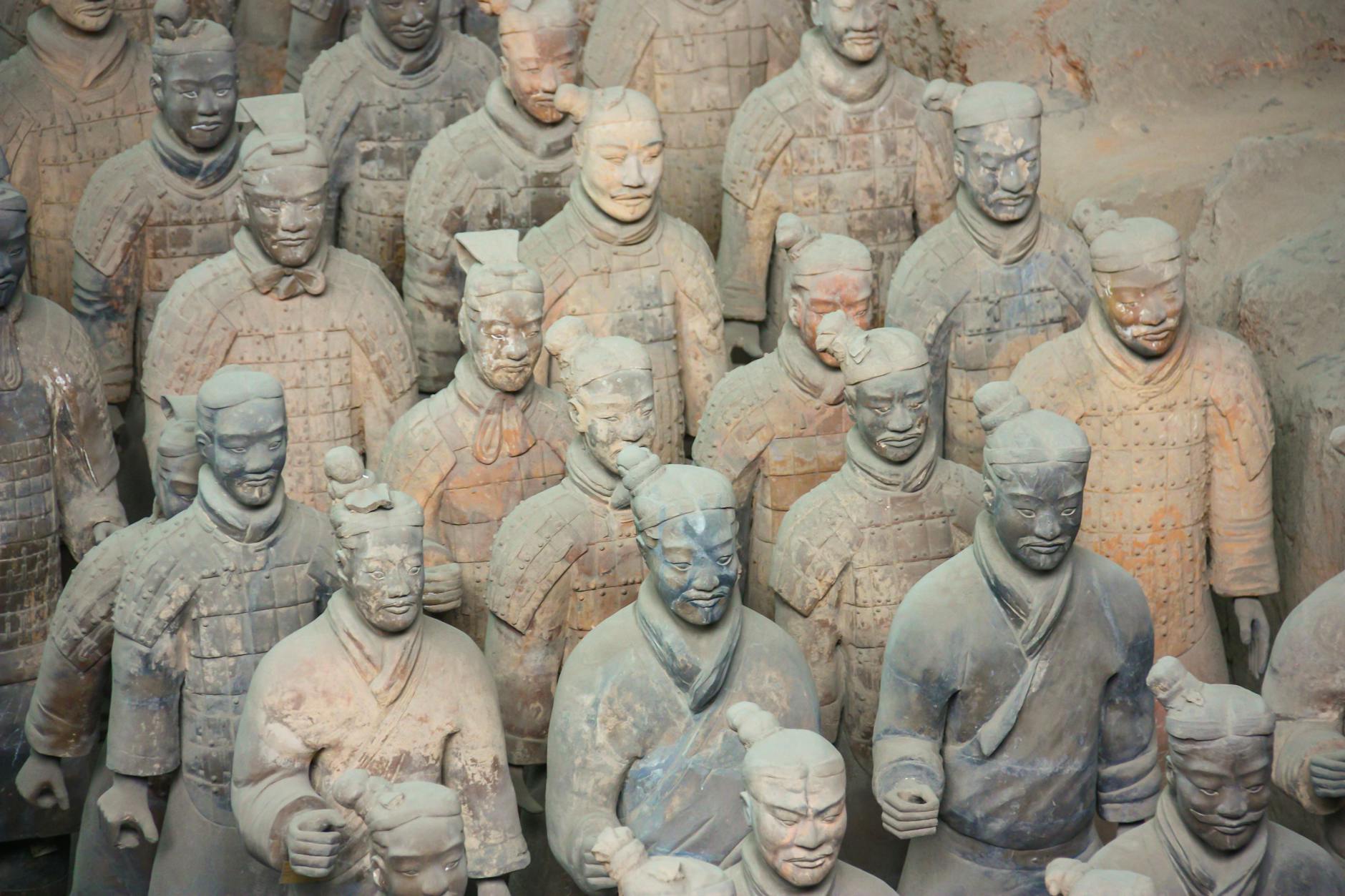 Close-up view of the ancient Terracotta Army statues in Xi'an, showcasing historical artistry.