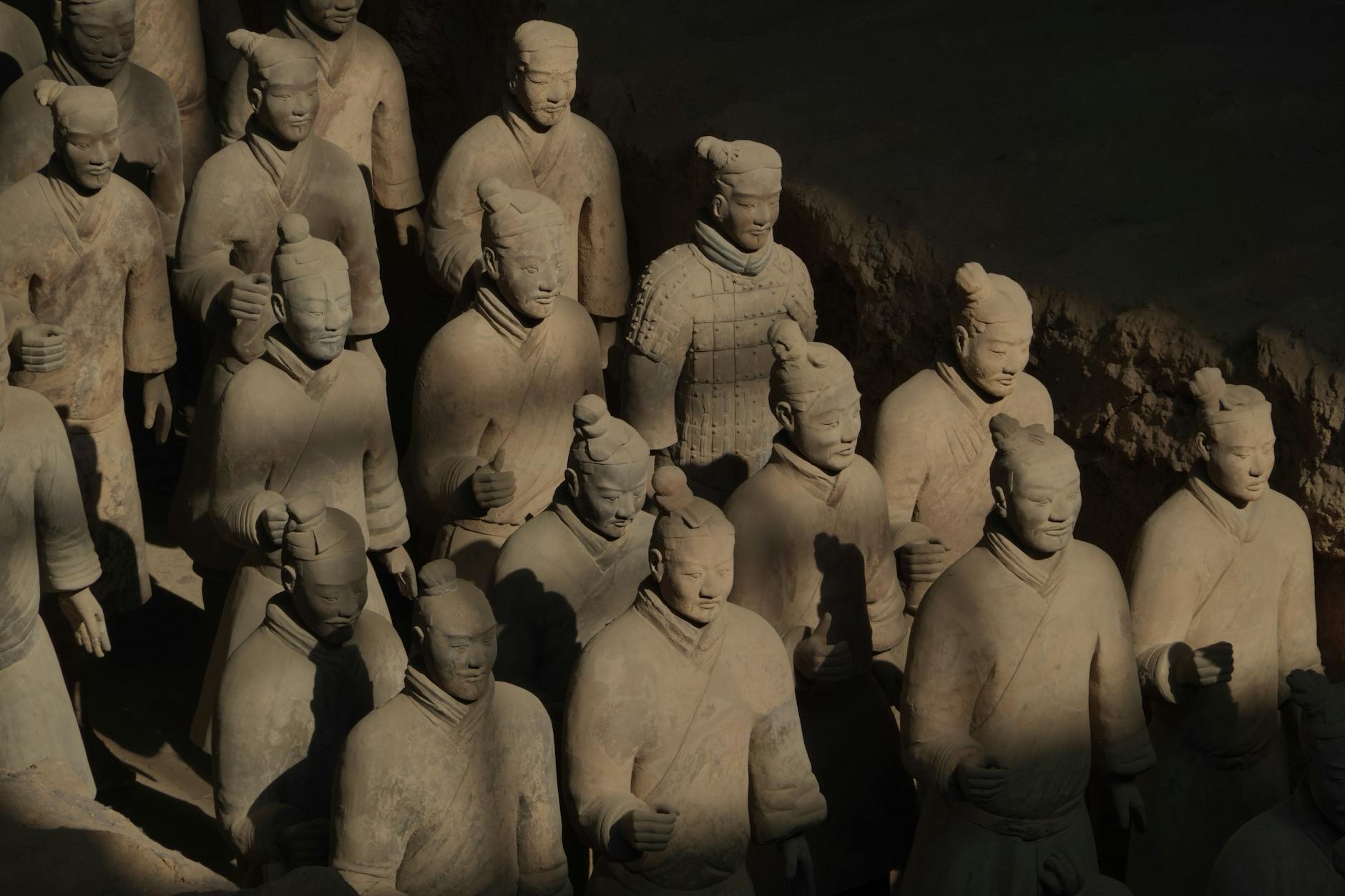 Terracotta Army statues in Xi'an exhibit ancient Chinese craftsmanship.