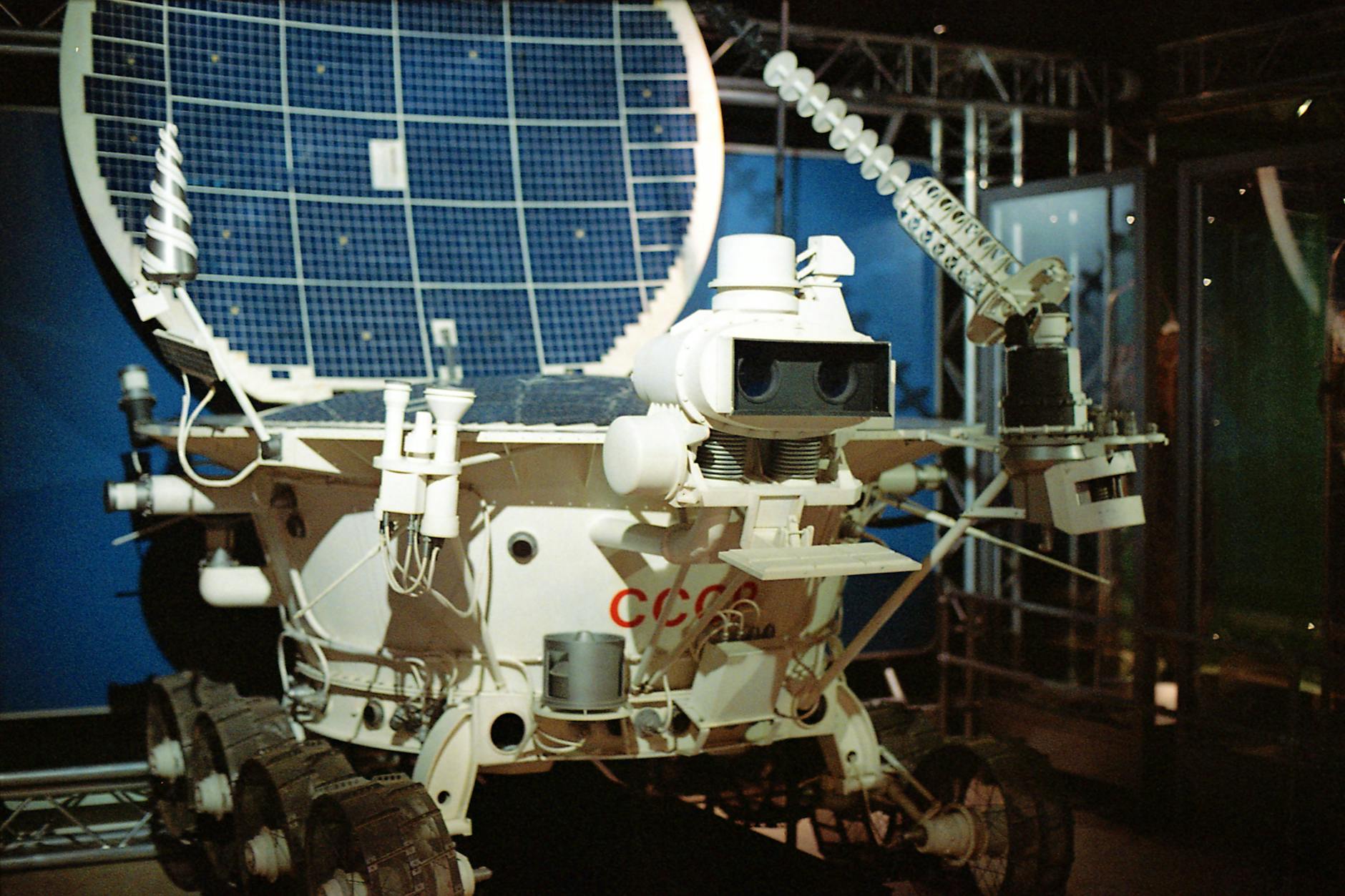 A Soviet Lunokhod lunar rover displayed in a museum, showcasing space exploration history.