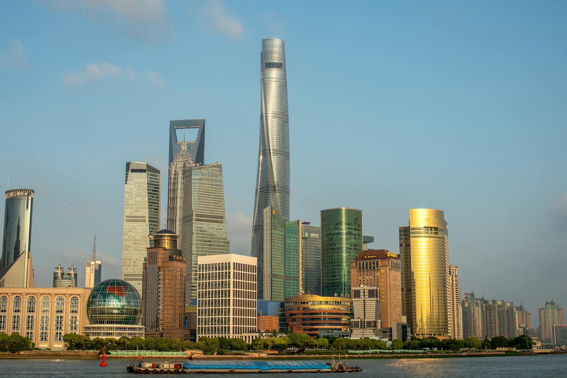 Stunning view of Shanghai's modern skyline with the iconic Shanghai Tower and financial district.