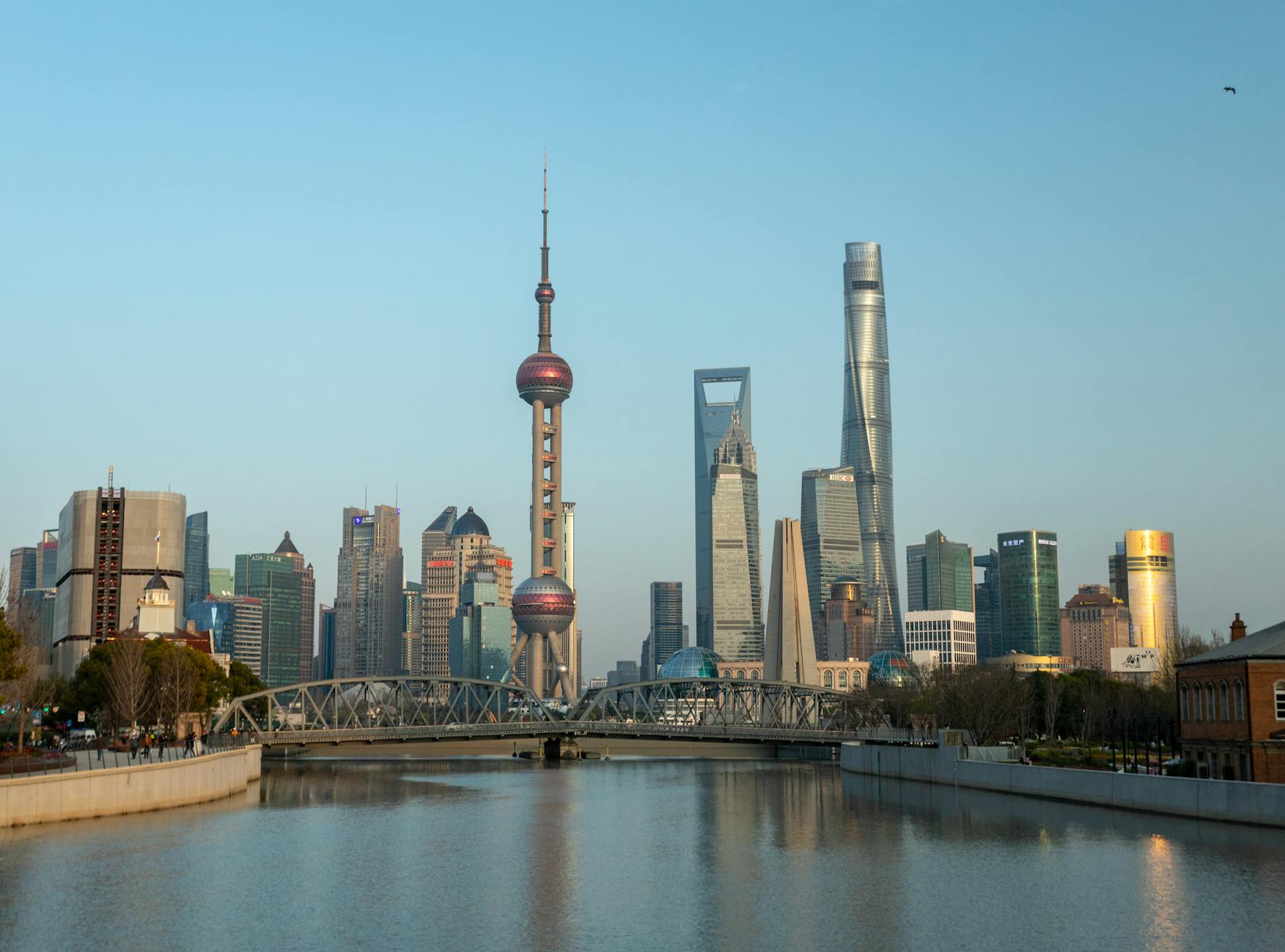 Stunning skyline of Shanghai featuring the Oriental Pearl Tower and modern skyscrapers.