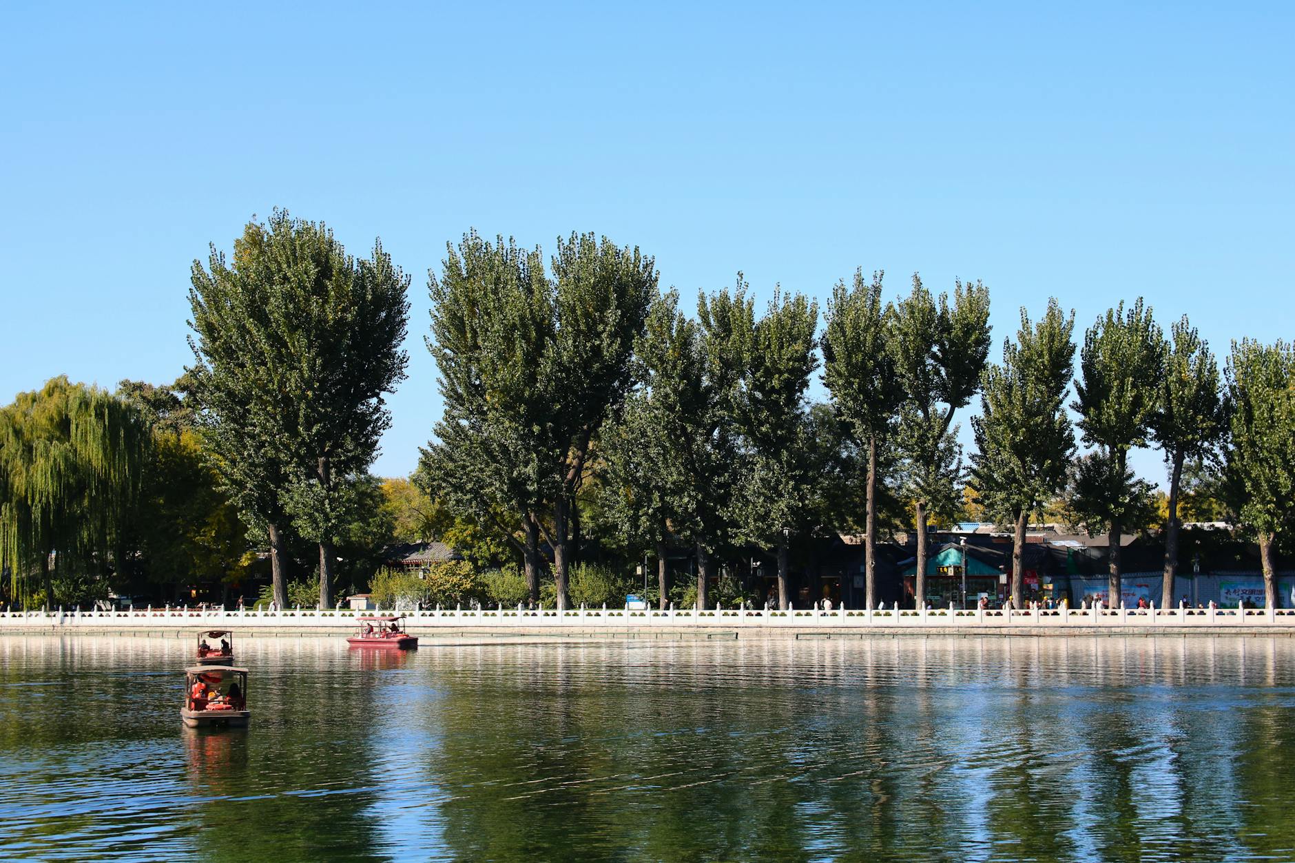 Enjoy a peaceful day by the trees and waters at Shichahai Lake, Beijing.