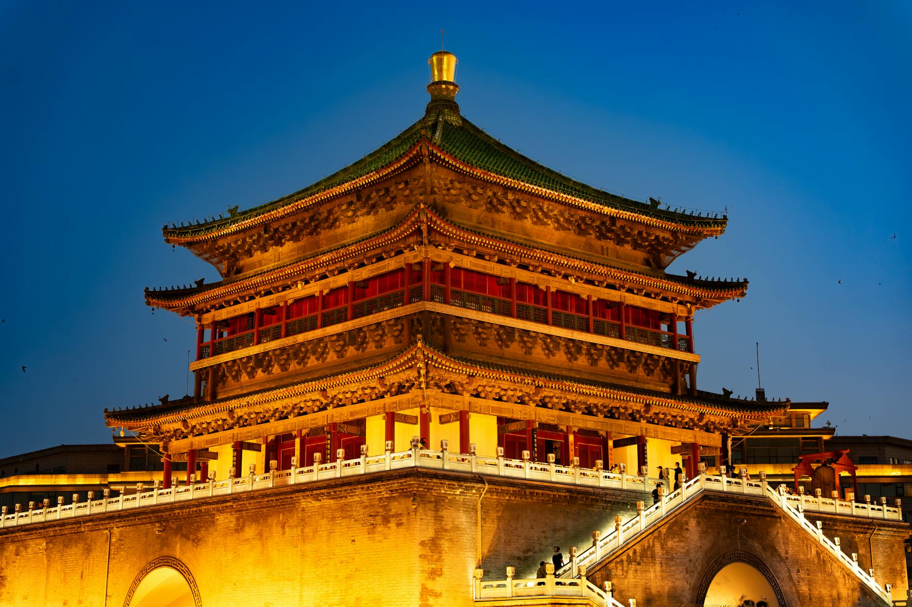 The iconic Bell Tower of Xi'an beautifully lit against a twilight sky.