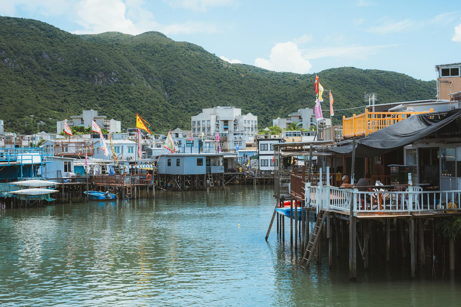 Picturesque stilt houses in Tai O, Hong Kong, showcasing traditional fishing village life by the water.