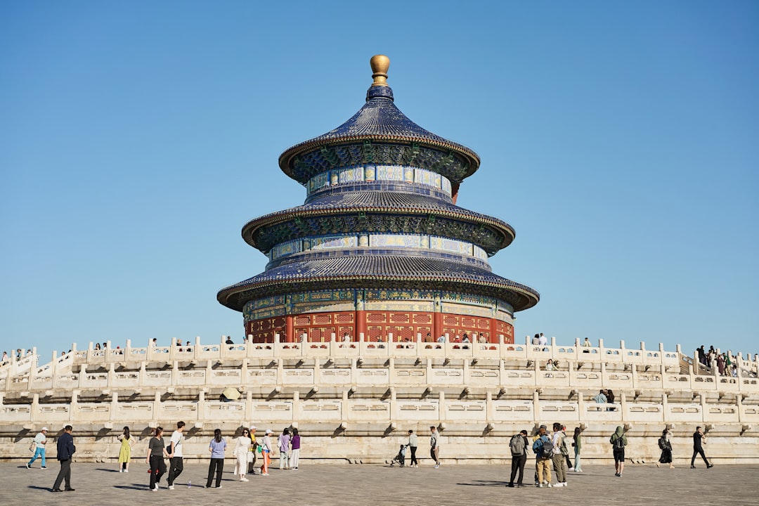 A group of people standing in front of a building