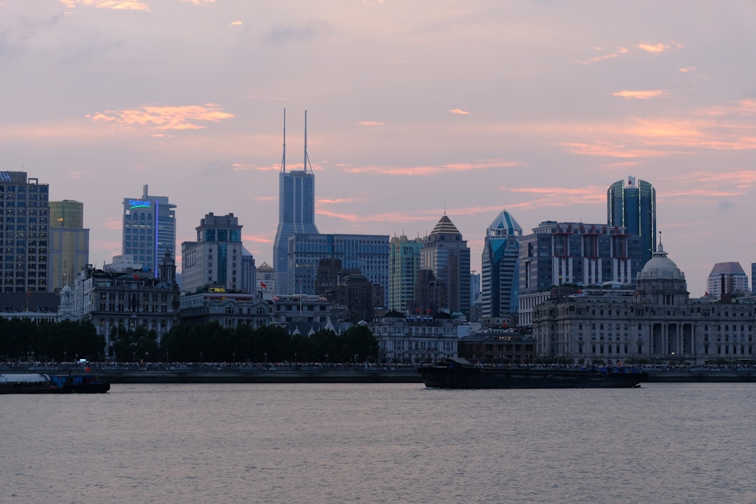 City skyline with modern buildings at dusk.