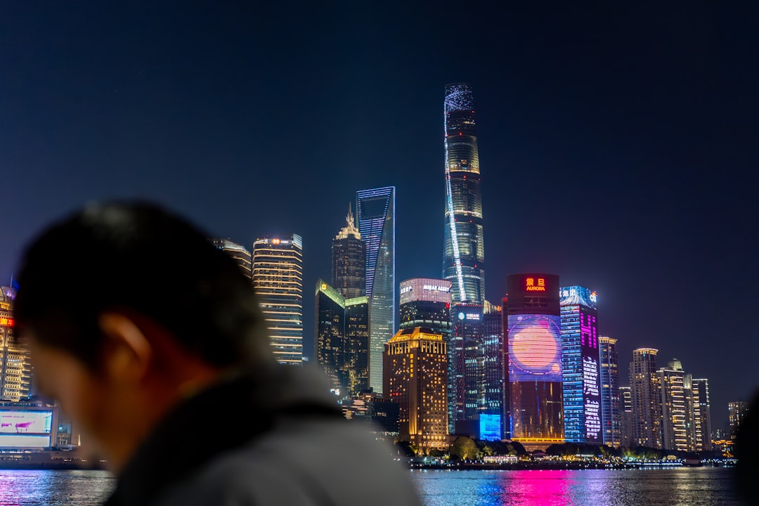 City skyline with illuminated skyscrapers at night