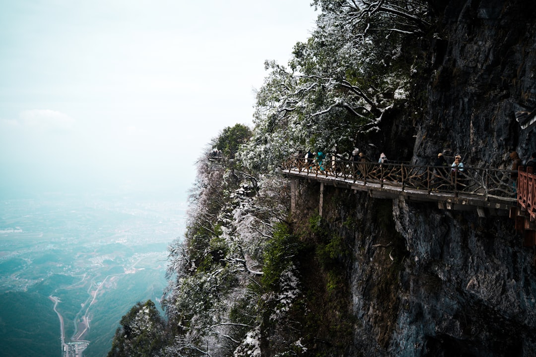 Cliffside pathway winds along a mountain.