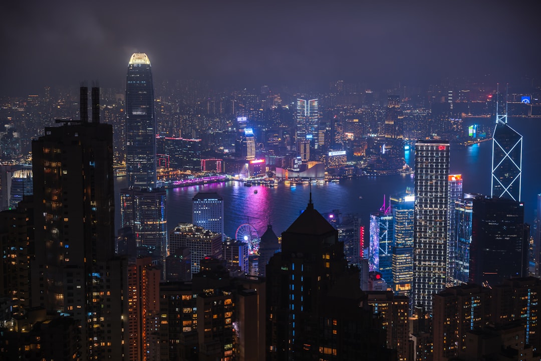 Vibrant cityscape with illuminated skyscrapers at night