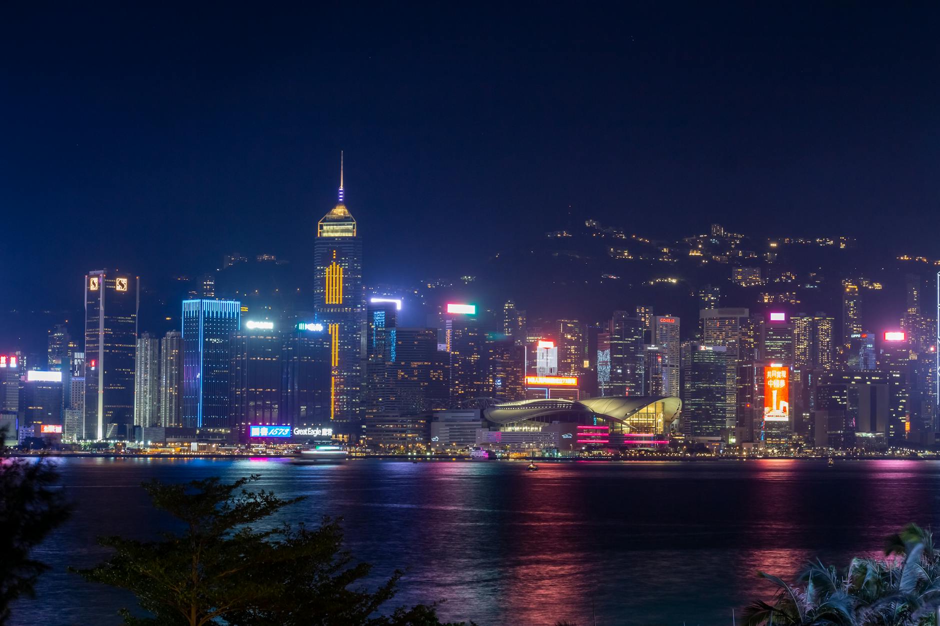 Spectacular night view of Hong Kong's skyline across Victoria Harbour.