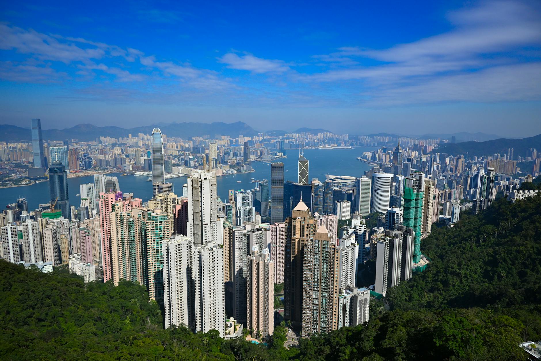Breathtaking aerial shot of Hong Kong skyline with iconic skyscrapers and harbor view.