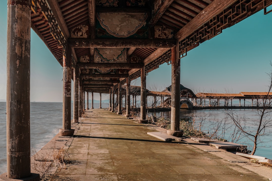 brown wooden dock on sea during daytime